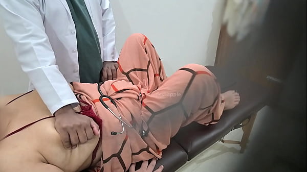 Doctor plays with his patients boobs